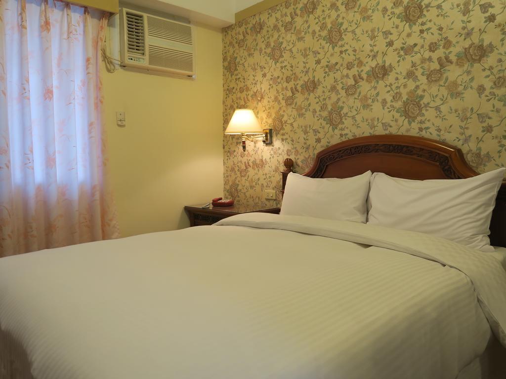 แชมป์เพนช์ โฮเต็ล Hotel เจียวซี ห้อง รูปภาพ